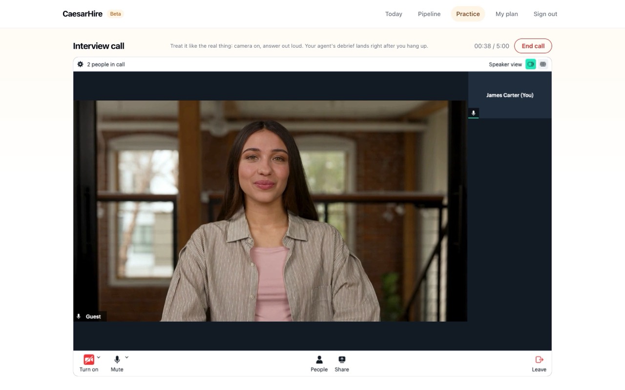 A practice interview call in progress, the video interviewer on screen and the clock running.